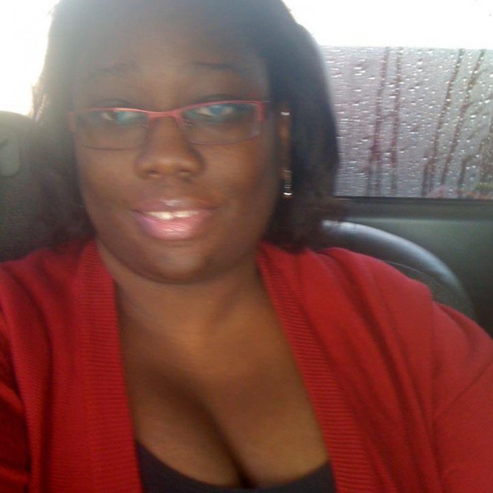 Mia in a red shirt