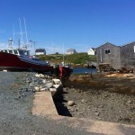 Blue sky red boat